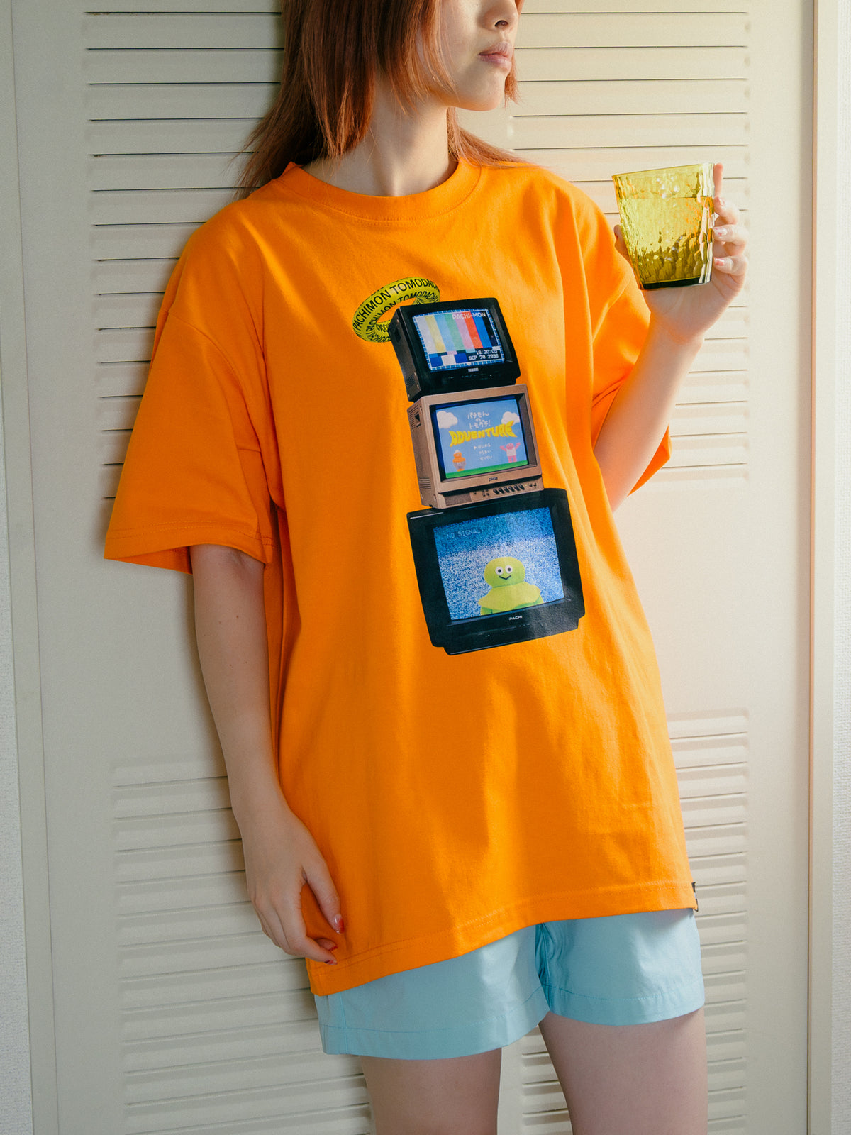 グラフィックTシャツ オレンジ / パチもんのトモダチ！ / The TOMODACHI！